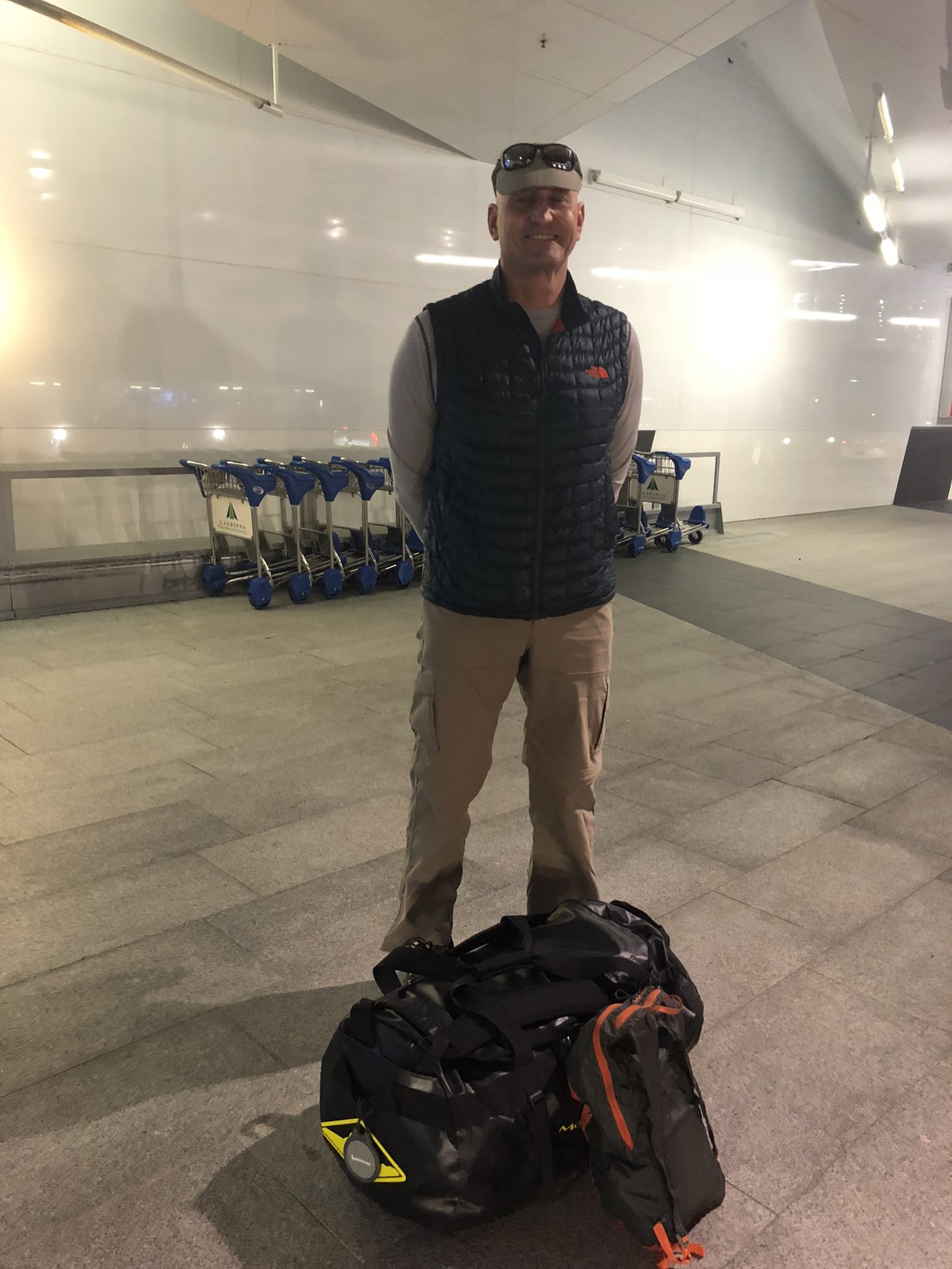 Tim at the airport ready to go